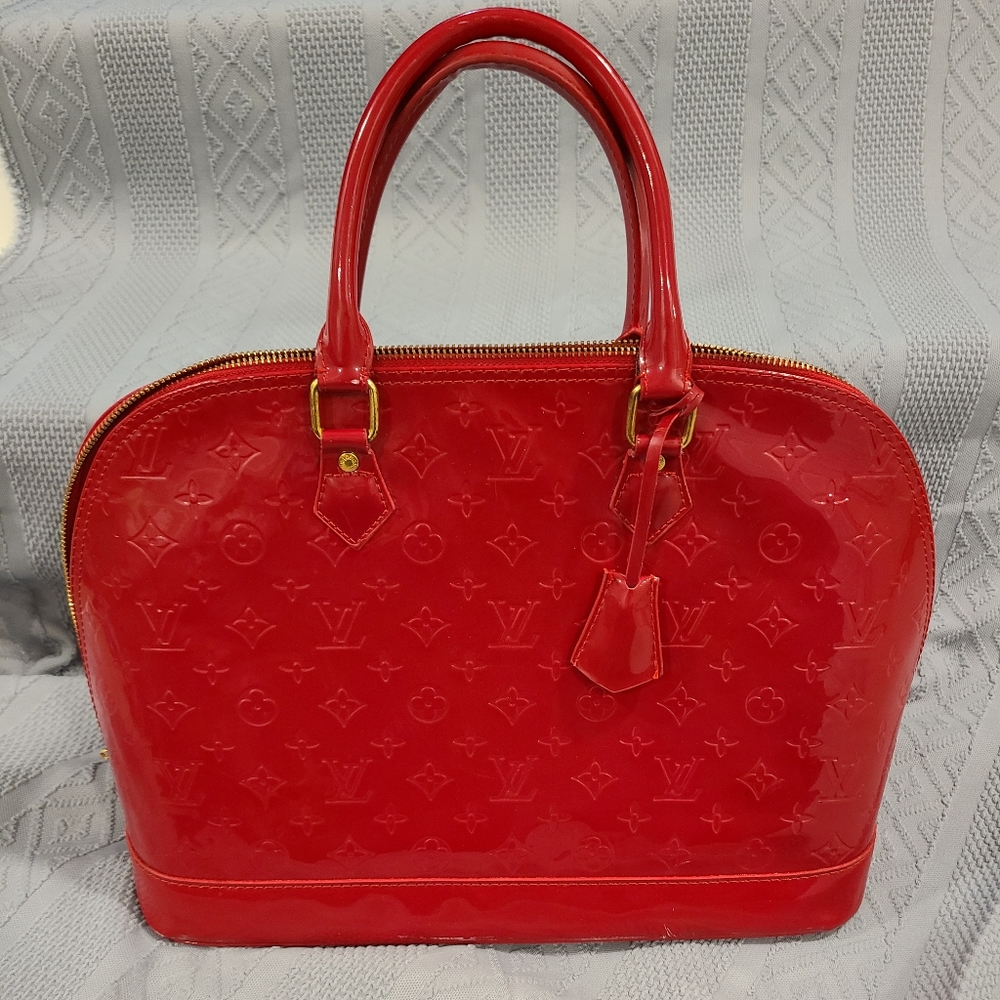 Louis Vuitton Alma Handbag
